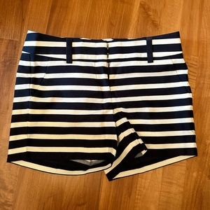 Two pairs of Ann Taylor shorts. Never worn. Size 0. Orange/white & navy/white